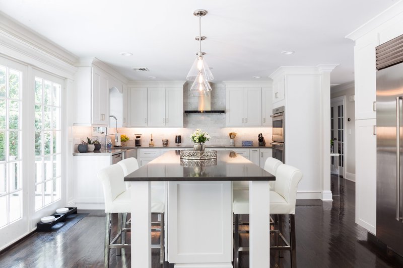 Beautifully designed kitchen space featuring S8 white J&K Cabinets